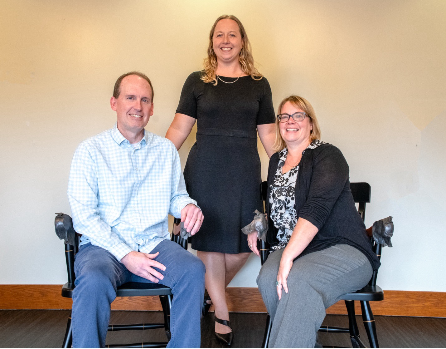 Lindsey Simon-Jones standing in between Kevin Maxwell and Nicole Hill.