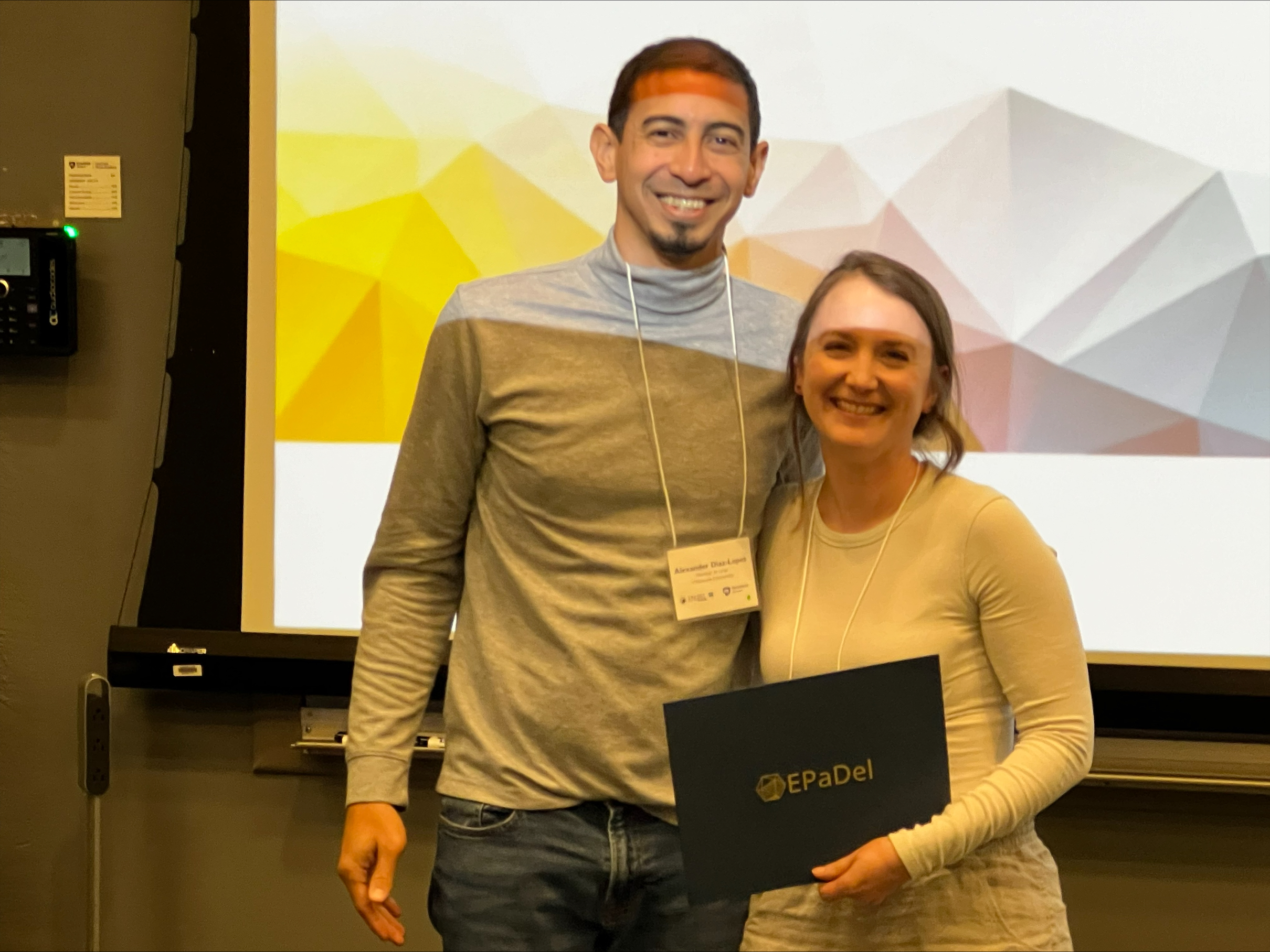 Samantha Pezzimenti holding certificate