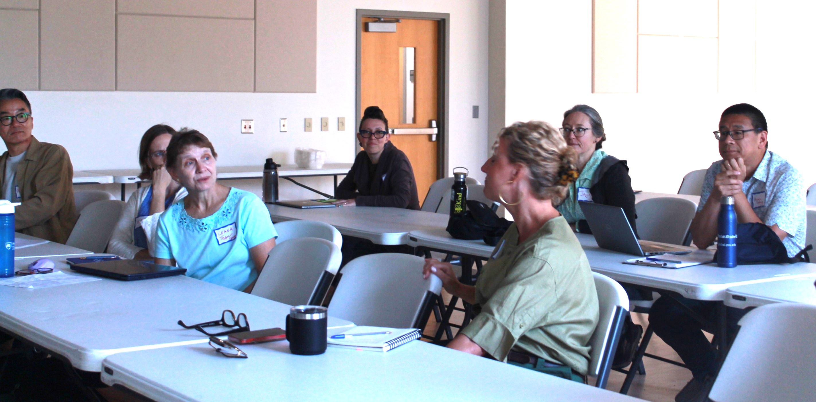 A group of faculty in a classroom during a training 