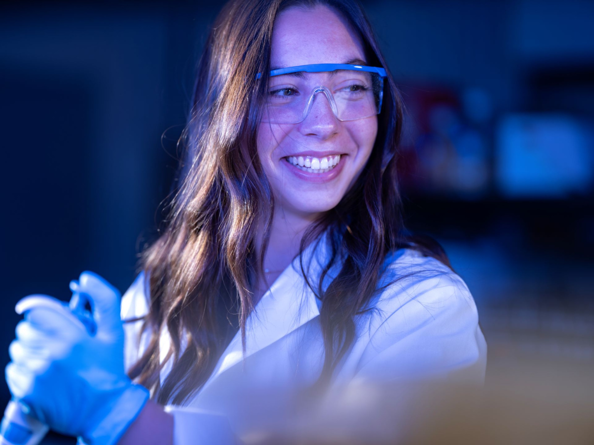 Woman working in research lab setting