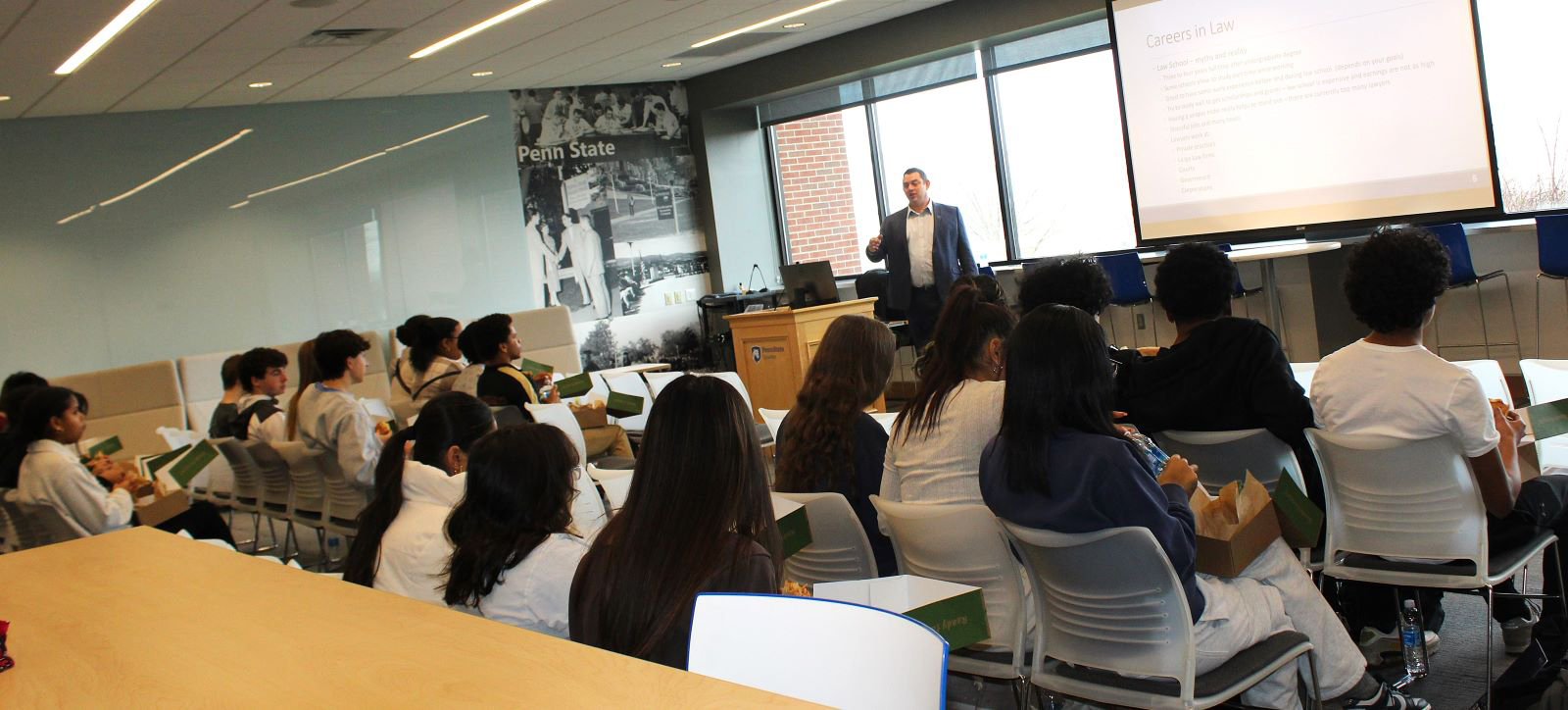 Attorney Joseph Litvak talks to students in the Sherbine Lounge