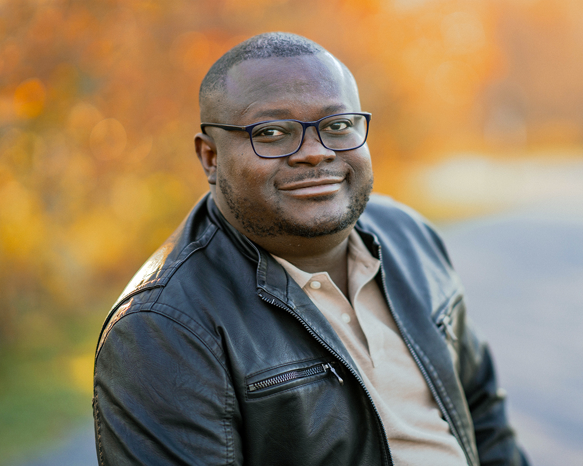 Outdoor photo of writer and Penn State assistant professor Samuel Kọ́láwọlé