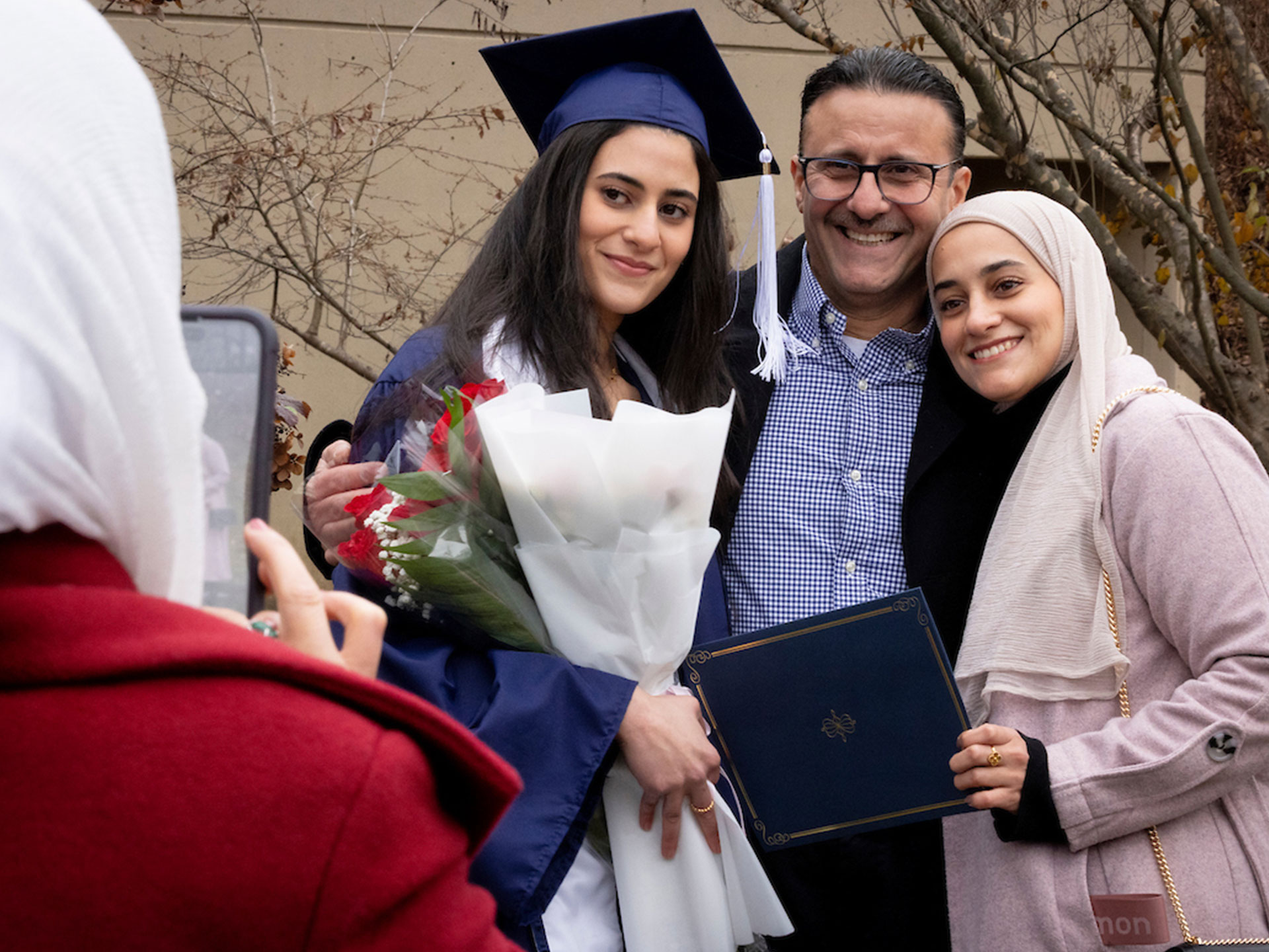 Family celebrating a new graduate