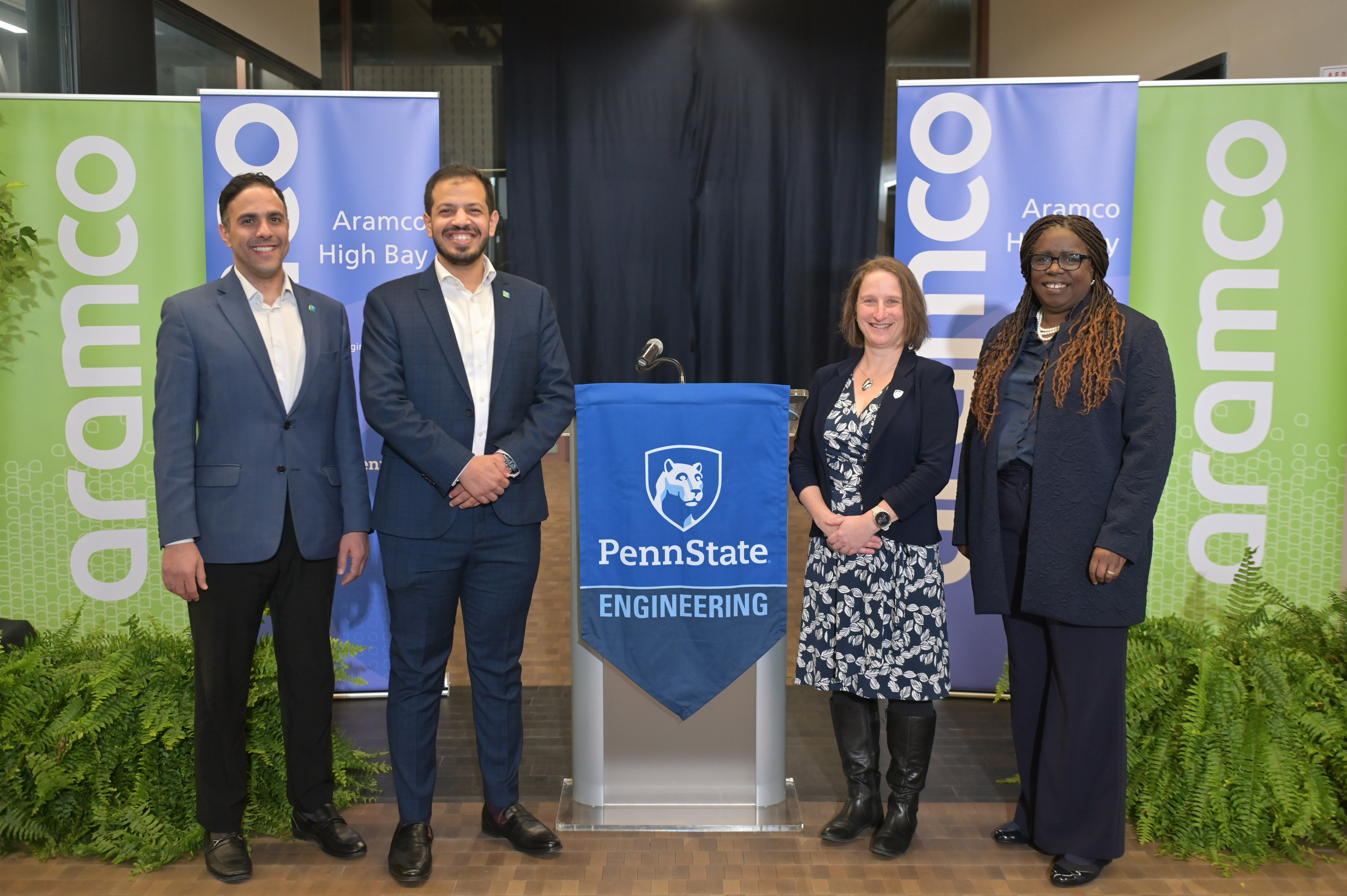 People standing near a podium