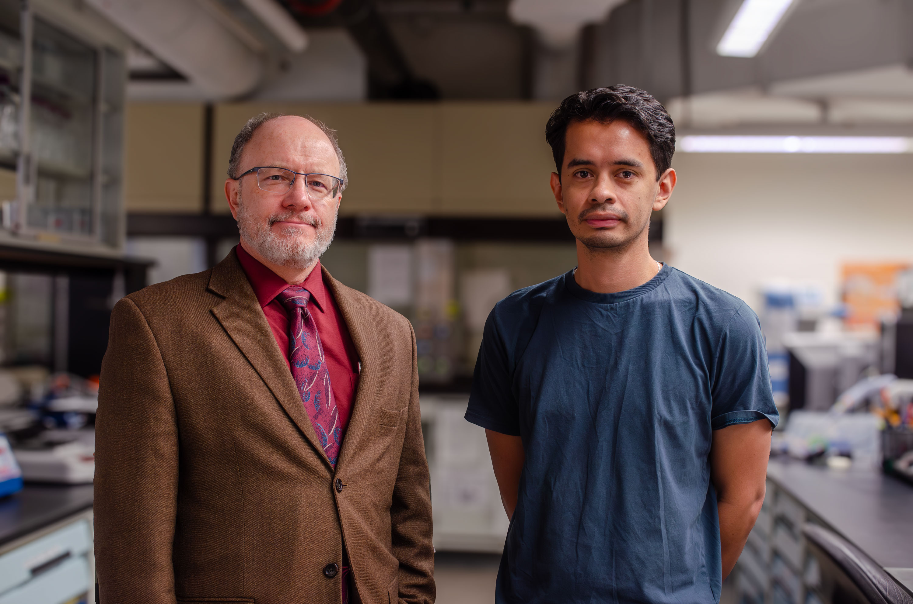 Thomas Gould and Carlos Novoa in Gould's laboratory