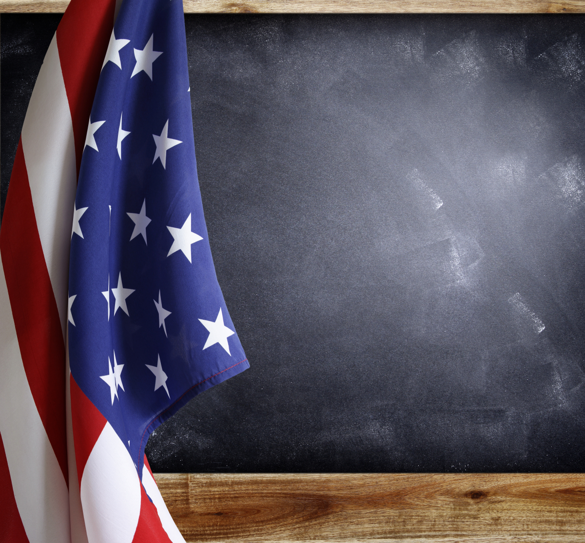 American flag in front of blackboard