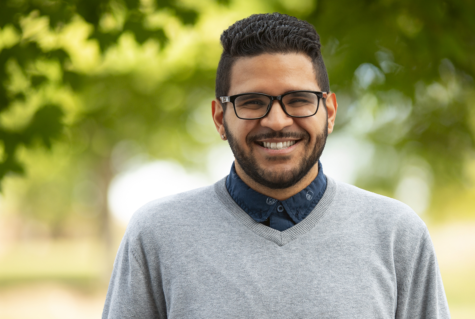 A photo of Navarro smiling