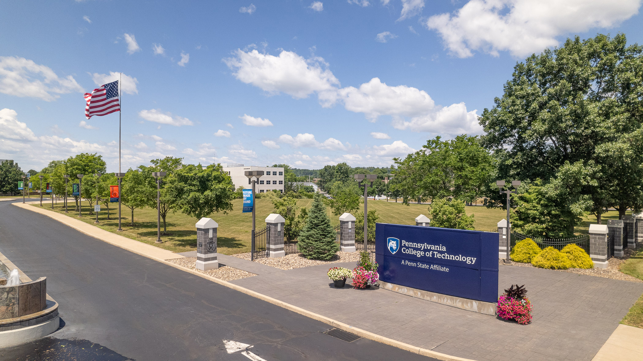 A wide view of the campus of Penn College on a clear day with blue skies