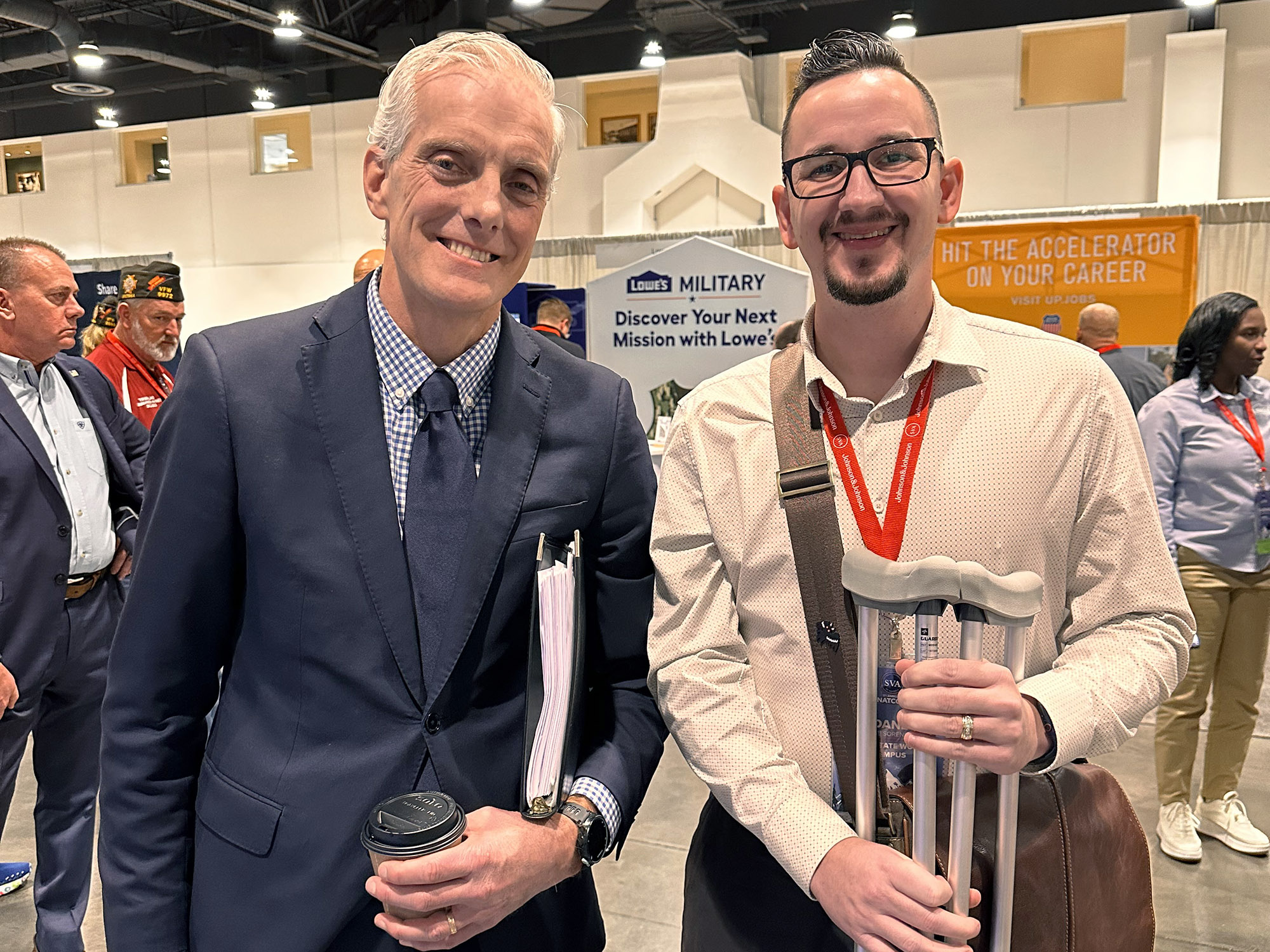 Dane Sorensen stands next to former U.S. secretary for veterans affairs Denis Richard McDonough 