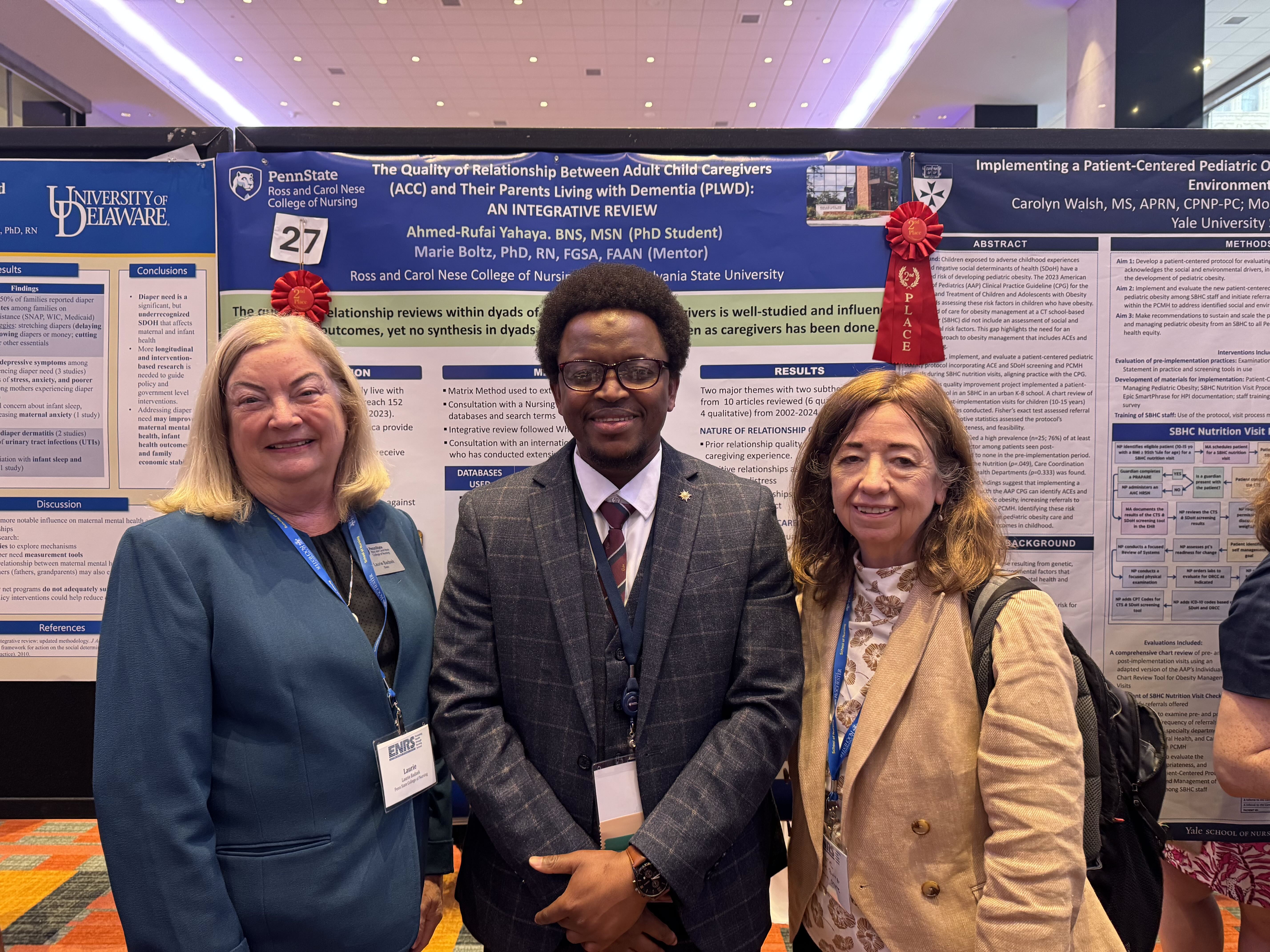 Ahmed-Rufai Yahaya (middle) pictured next to Laurie Badzek (left) and Marie Boltz (right).