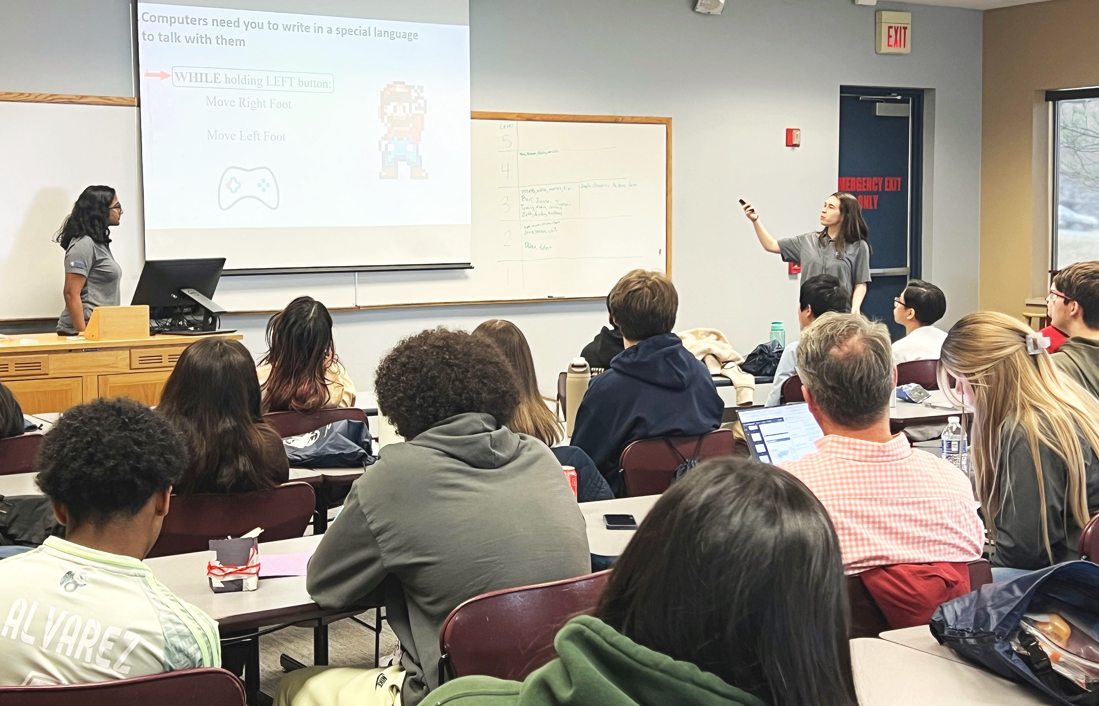 High school students enjoy a presentation by Penn State Engineering Ambassadors