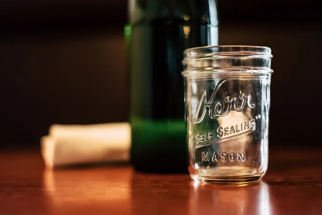 A canning jar on the table 