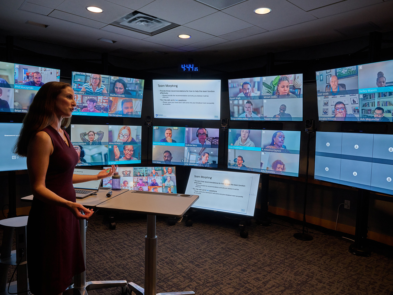 Margaret Luciano teaches in one of Smeal's virtual teaching studios in front of an array of monitors