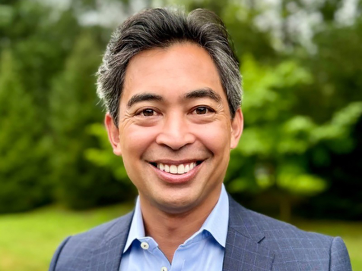 A head and shoulders shot of a smiling Tony Talbert