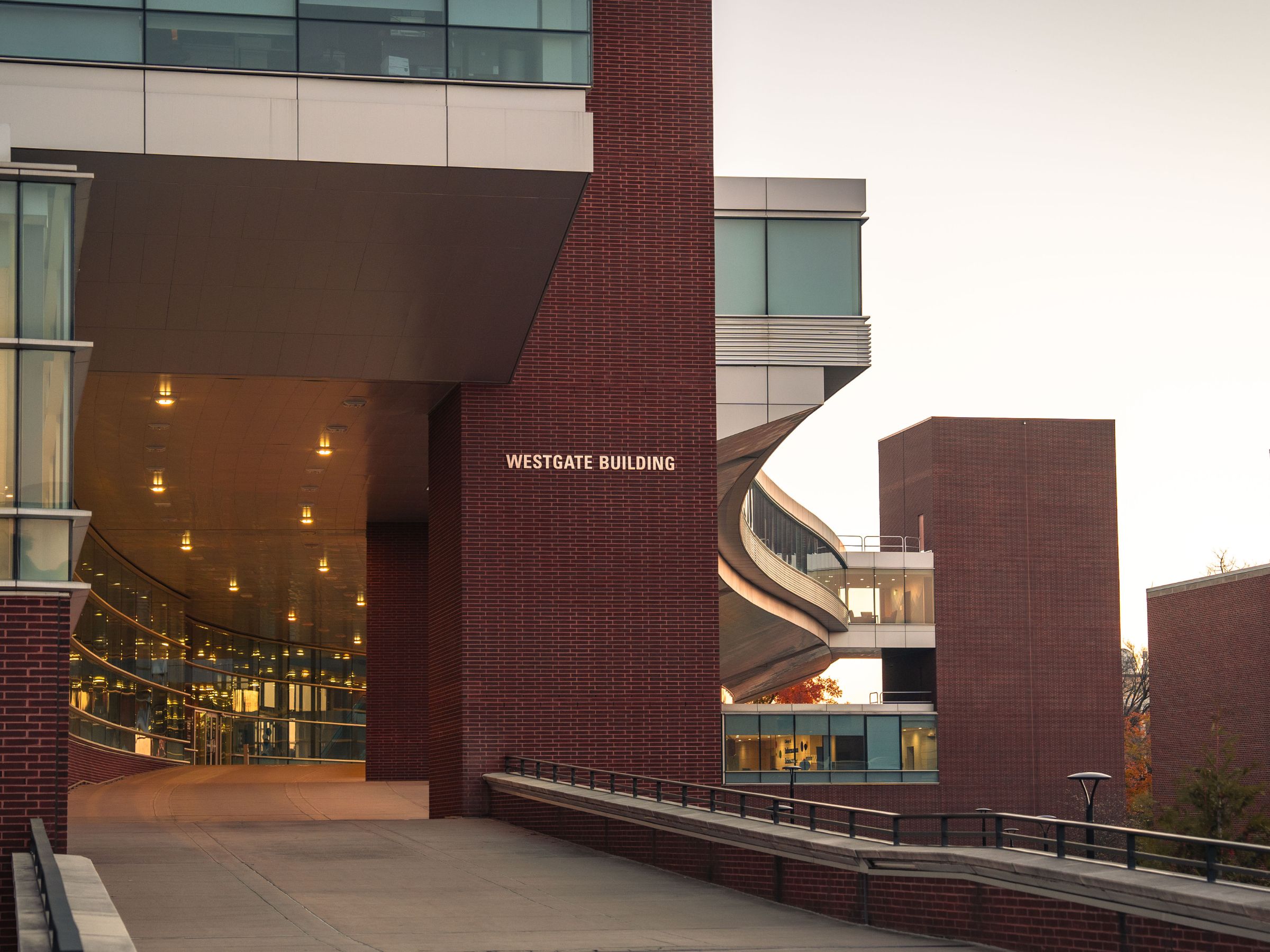 campus building of red brick and glass