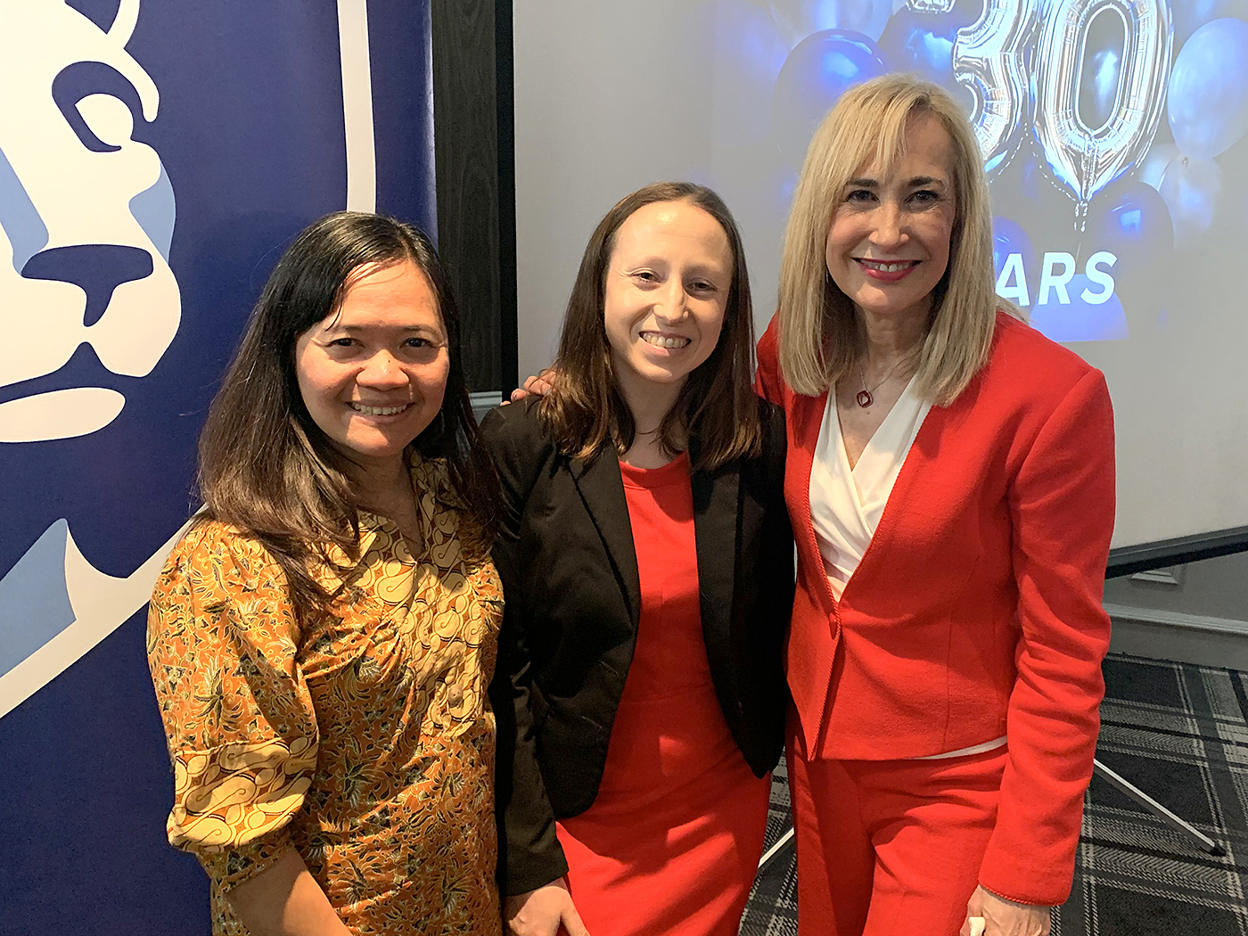 Three smiling women