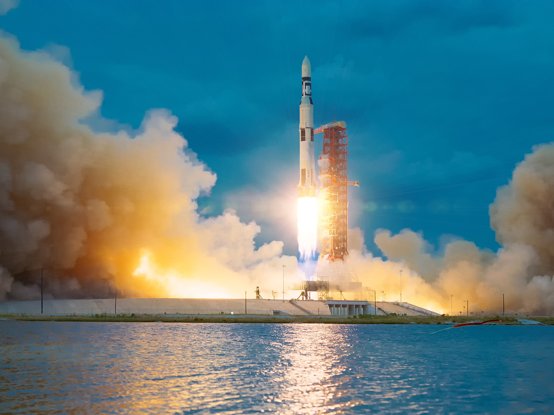 Saturn V space rocket taking off