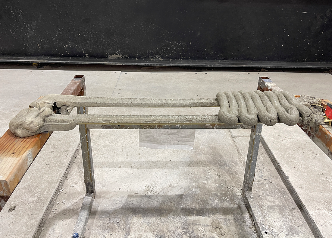 Freshly extruded 3D printed concrete.