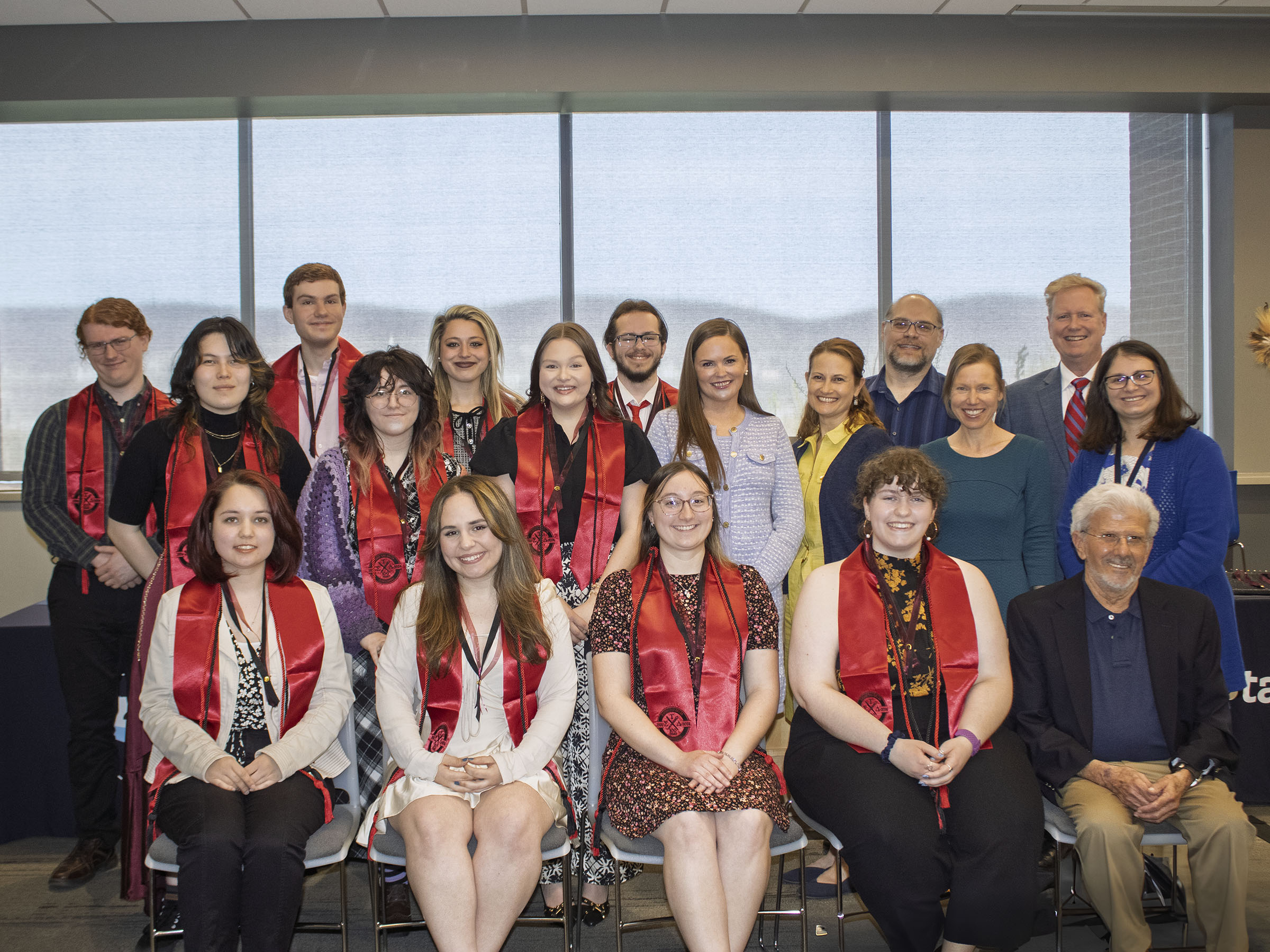 group of honor society inductees pose for a group photo