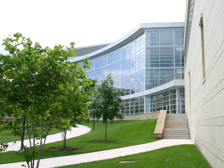 A photo of the Penn State Business Building in the summer from Park Avenue.