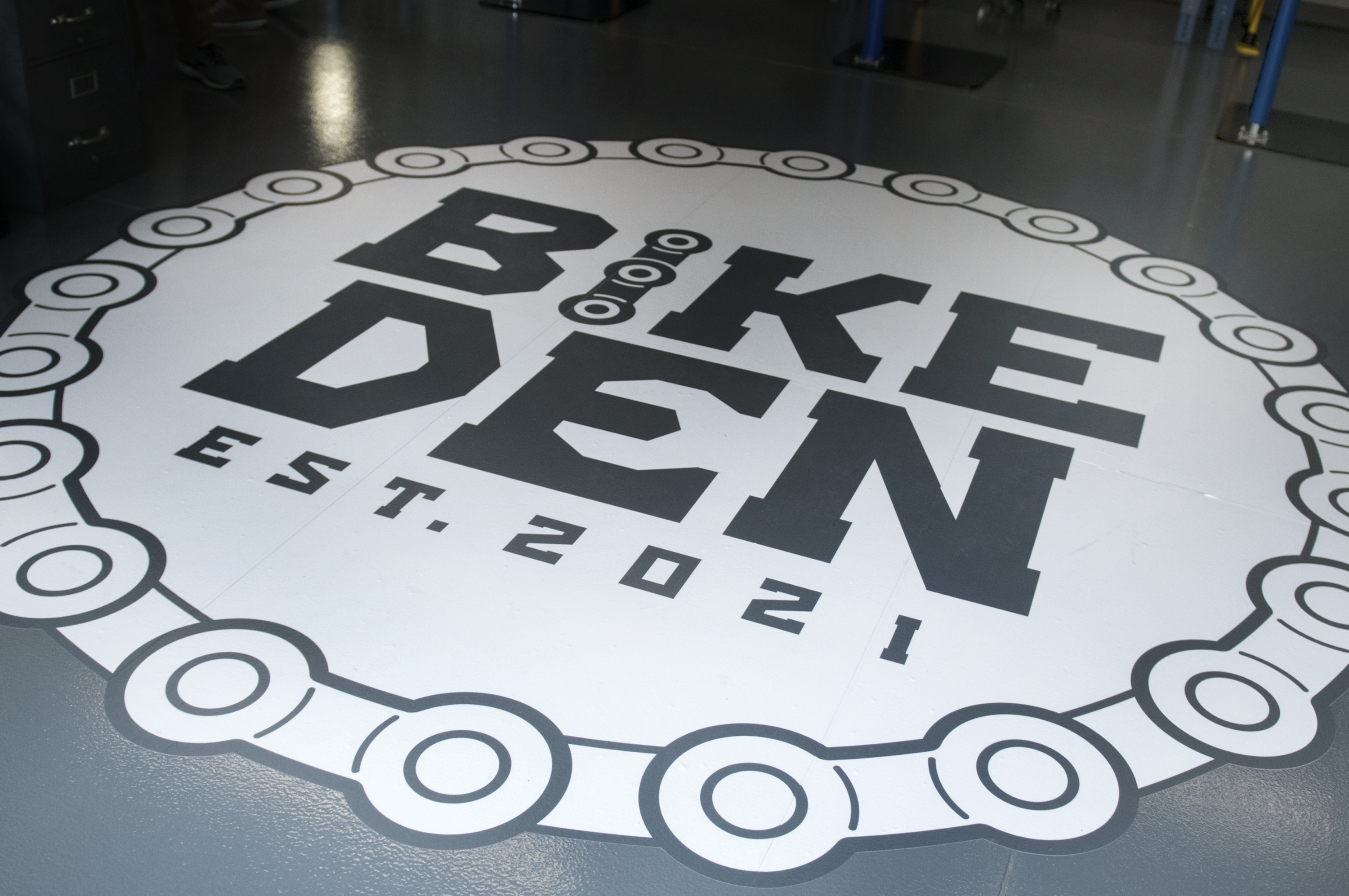 Bike Den floor sign