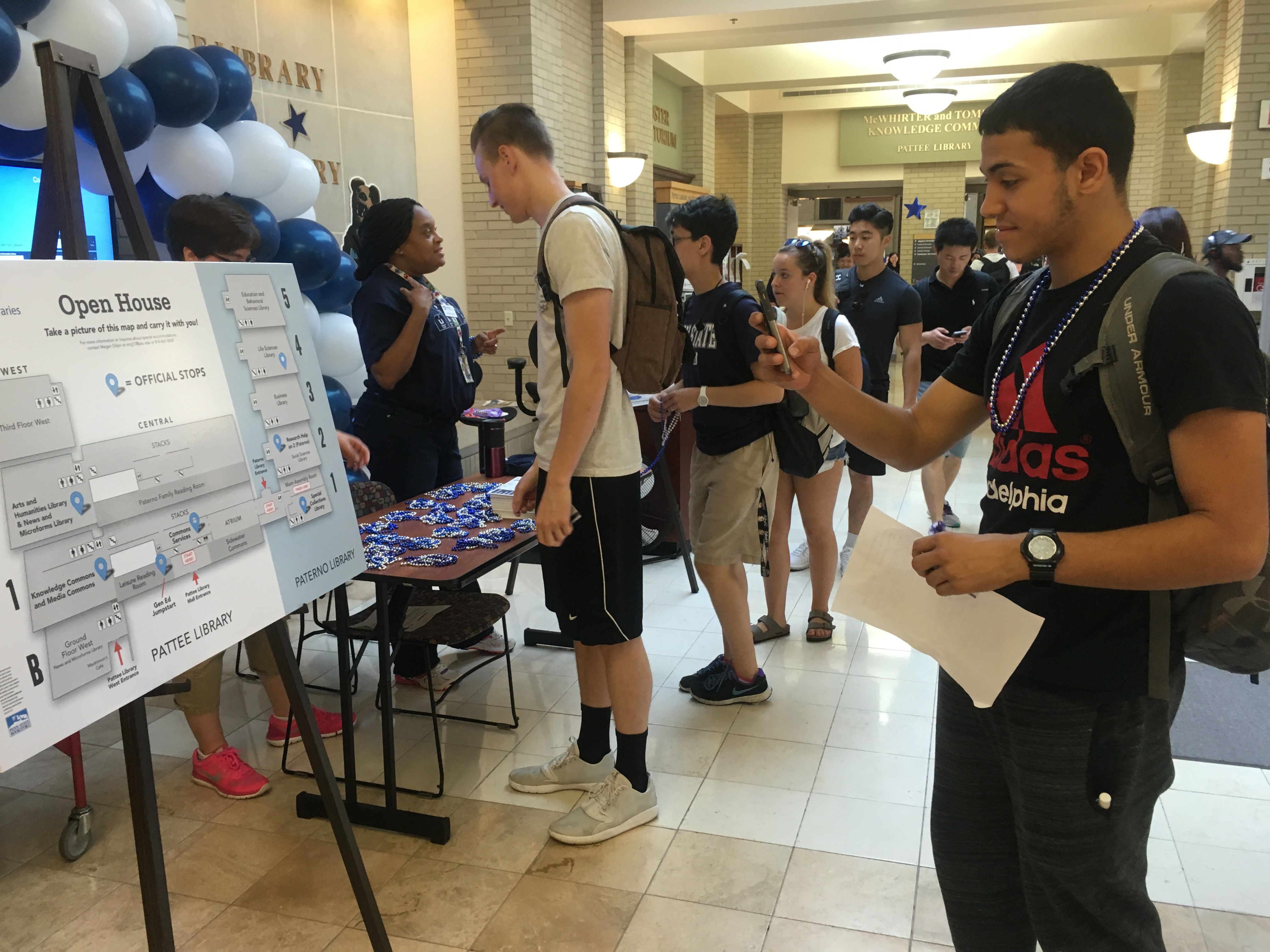 Students at University Park are reminded to bring their student I.D. cards to the University Libraries' Open House event — they swipe to check in at each stop on the Open House tour.