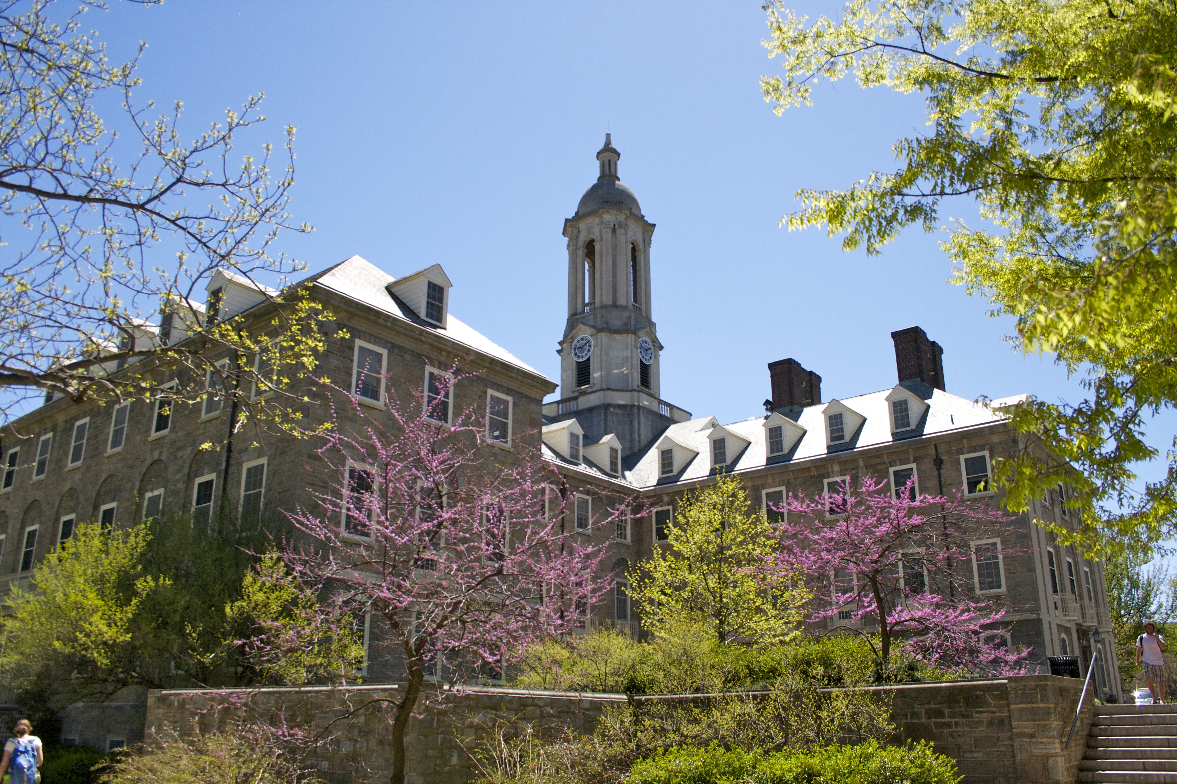 Old Main with foliage