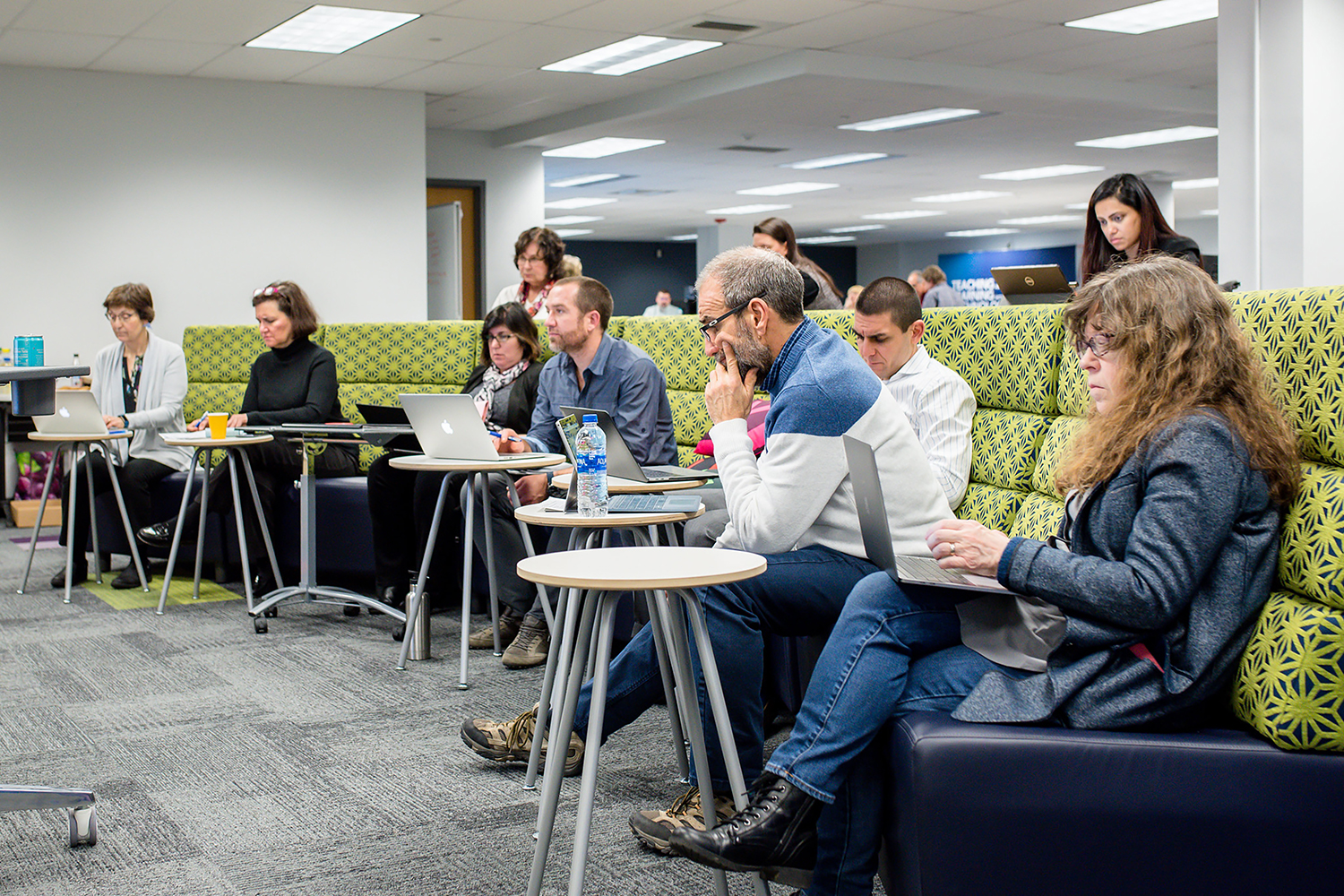 Faculty members gather for a meeting