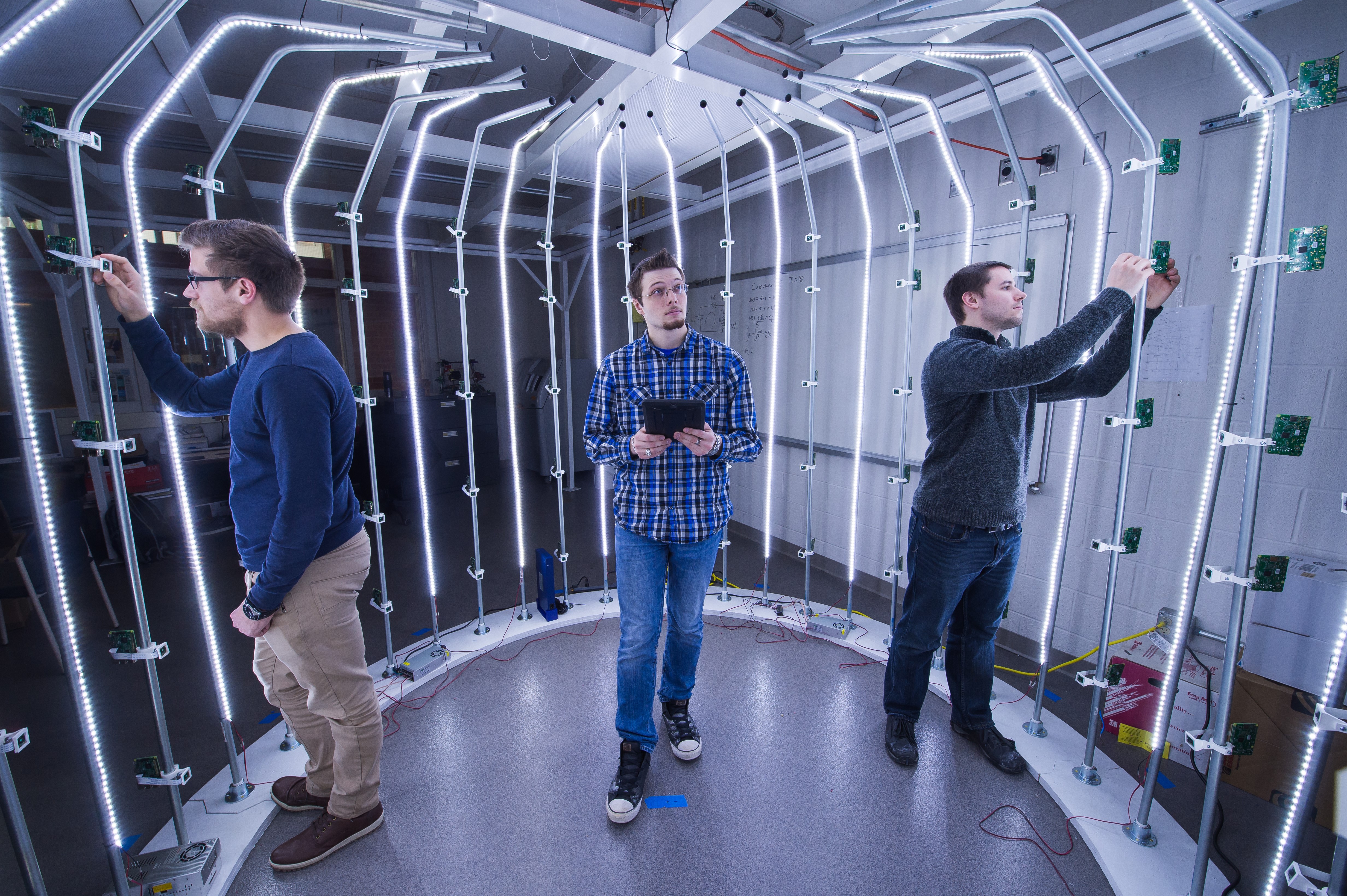 Three students work in Penn State Behrend's Innovation Commons, an ideation and rapid-prototying space.