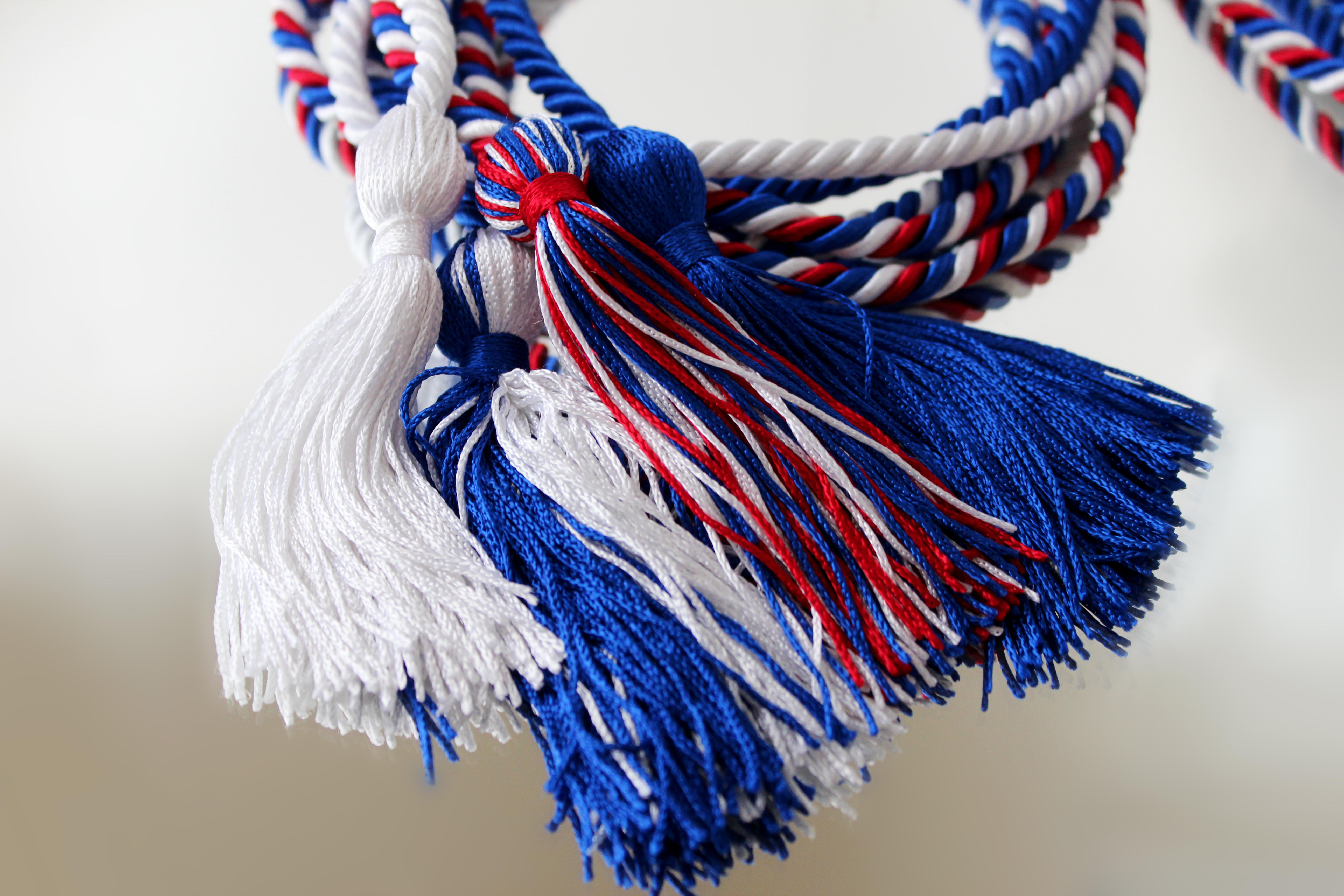 Red, white and blue honor cords