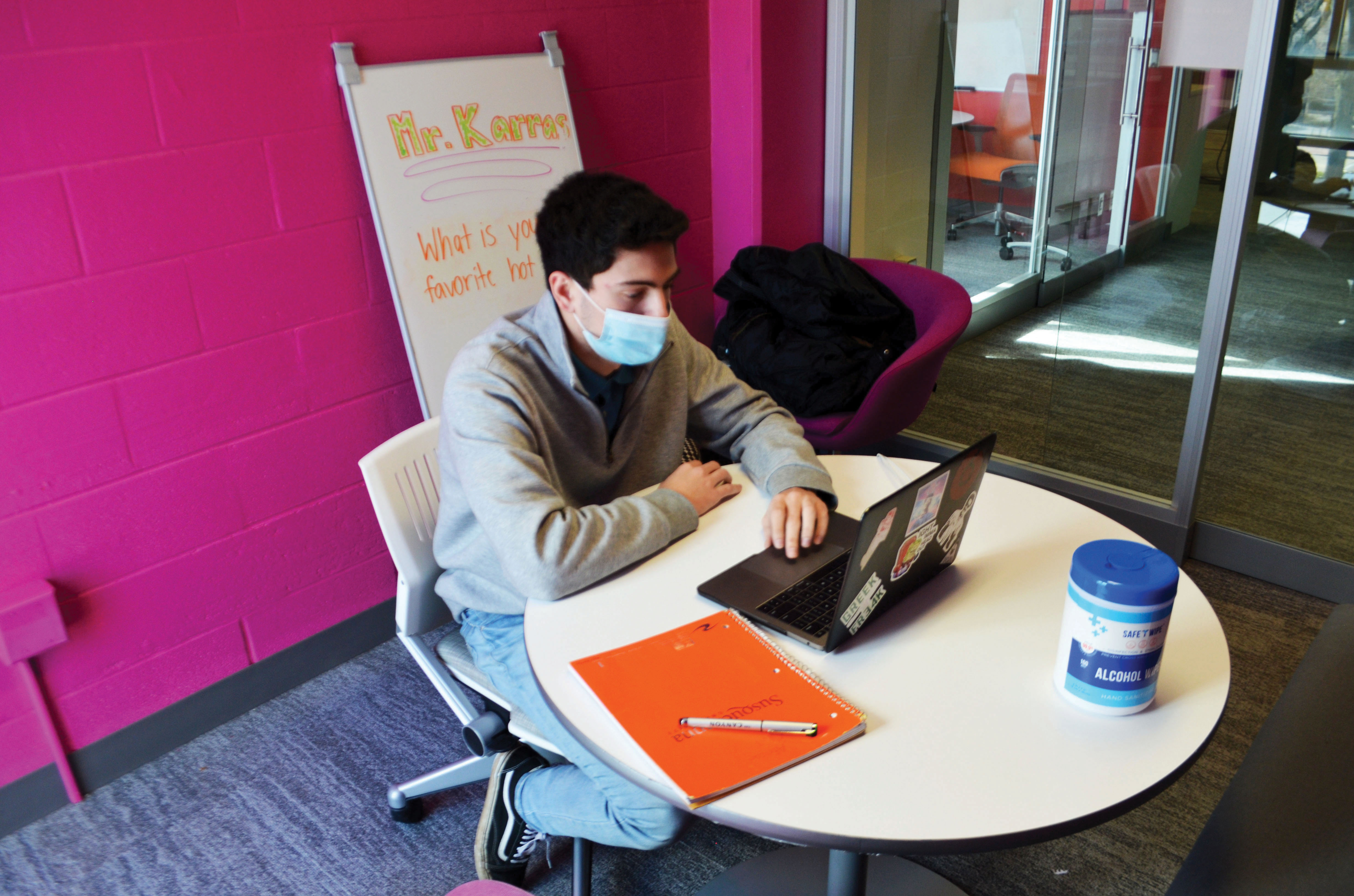 Student teacher Alex Karras conducts a classroom session at Mount Nittany Middle School from his Krause Studio office inside Chambers Building.