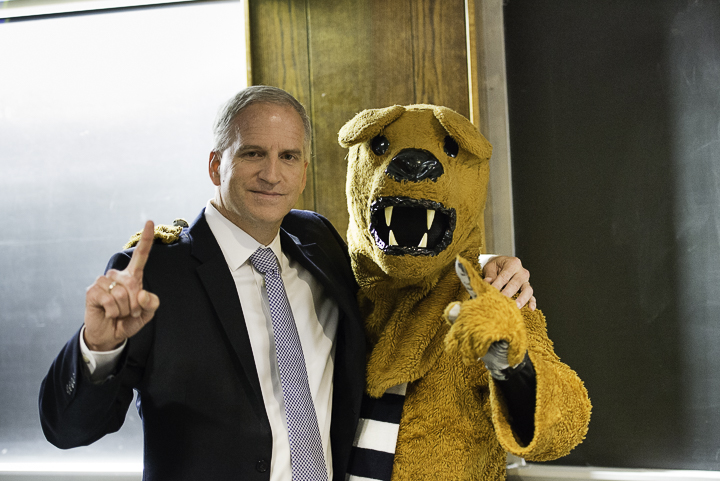 robert cardillo standing next to the penn state nittany lion