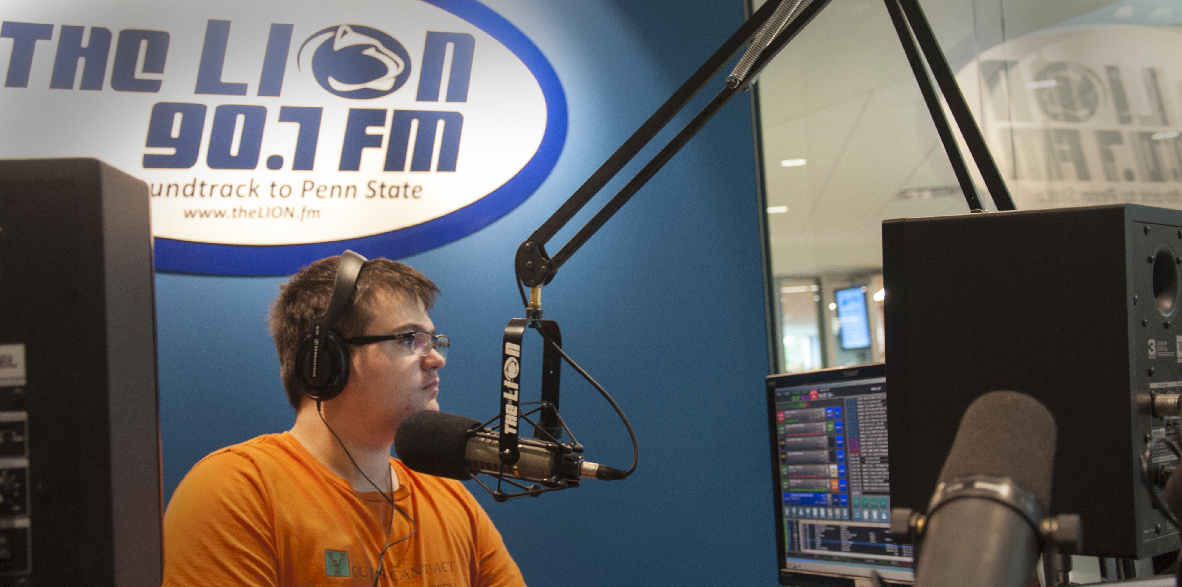 Alex Mellott at the Lion FM studio in the HUB