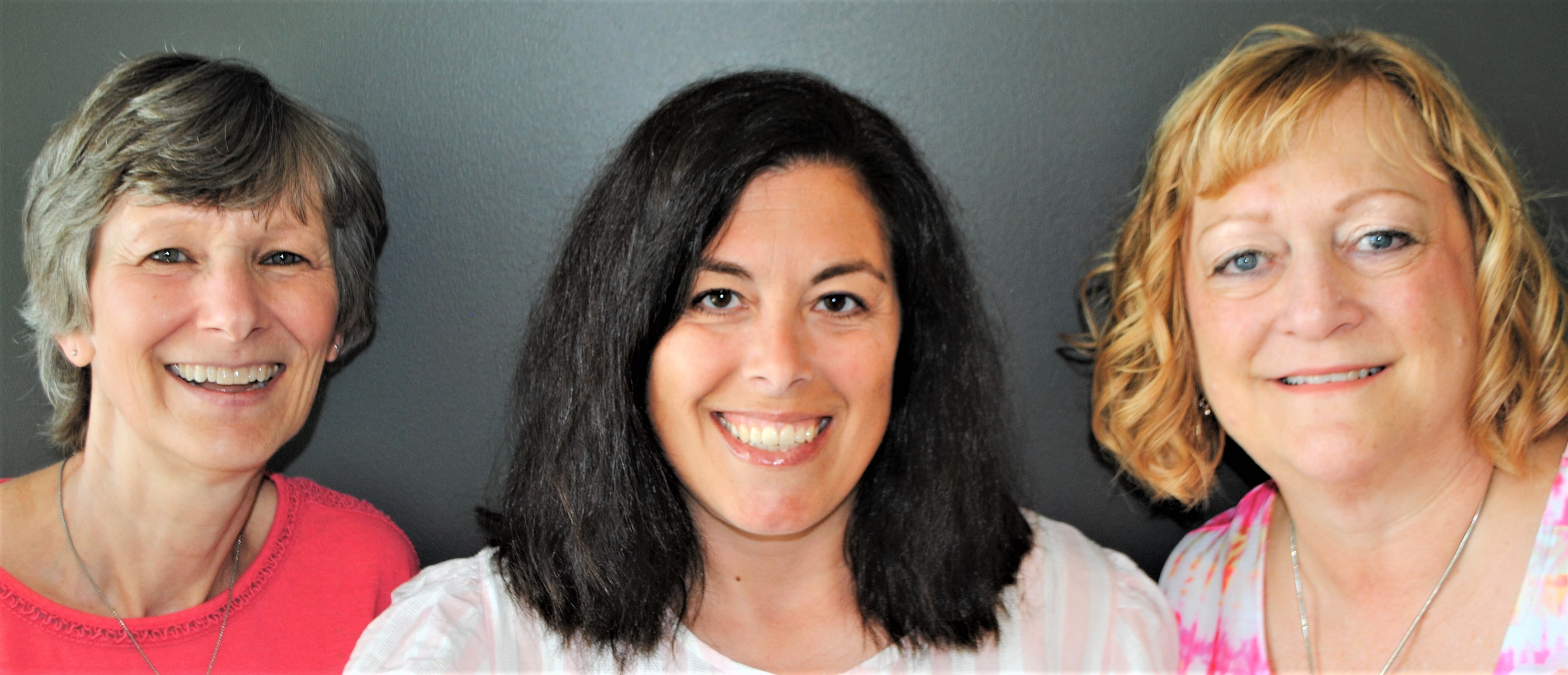 Julia Glover, Dawn Coder, and Terry Musser pose for a group photo