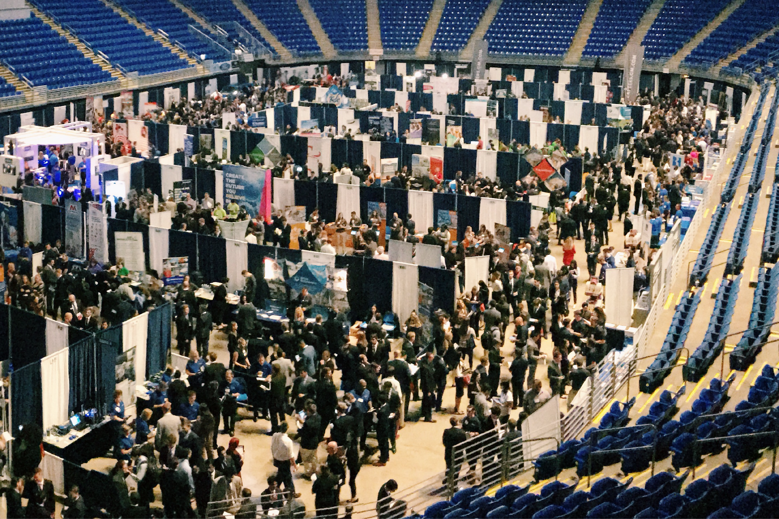 Hundreds of employer booths fill the Bryce Jordan Center arena floor during Fall Career Days