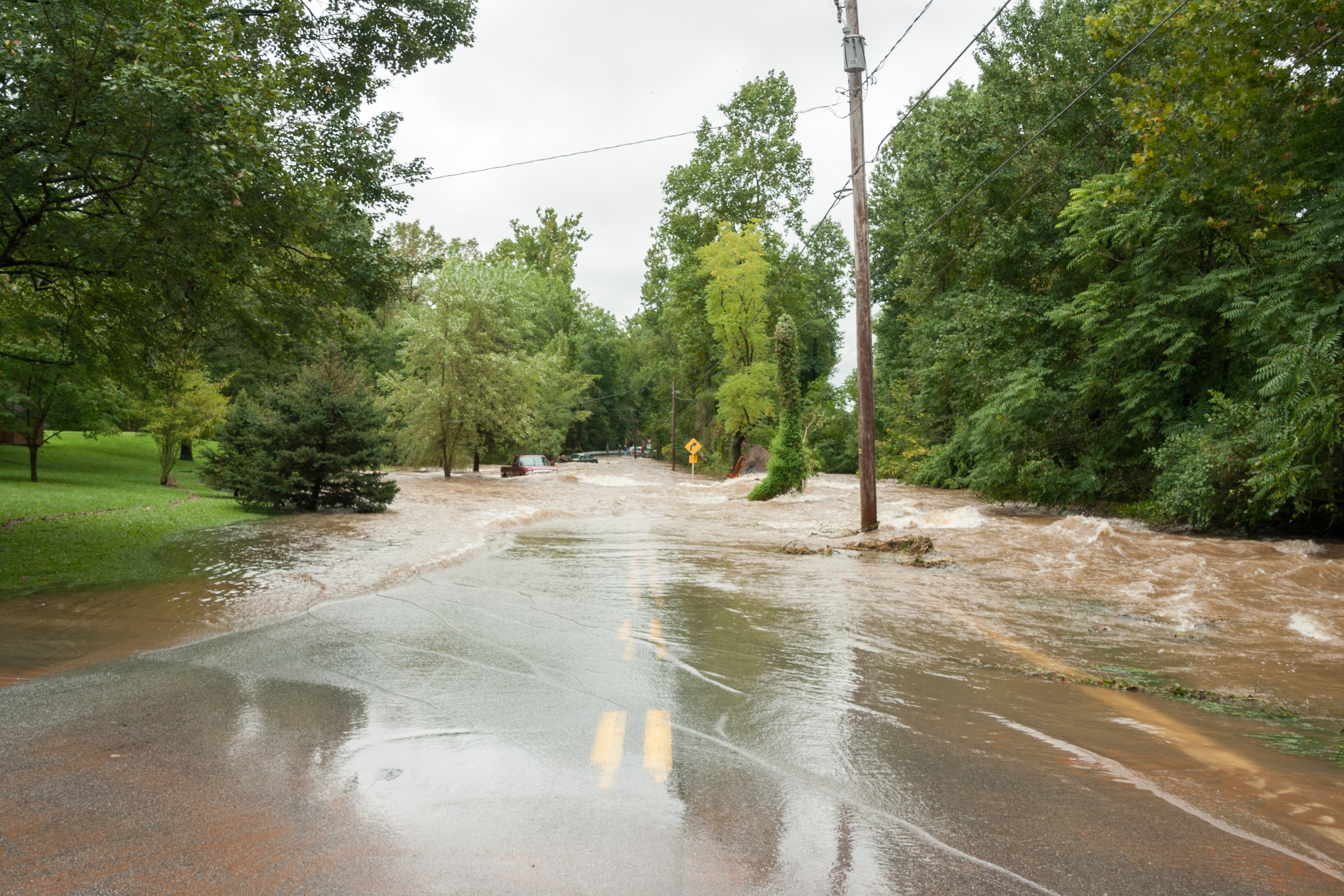 Flooding causes damage property and roadways