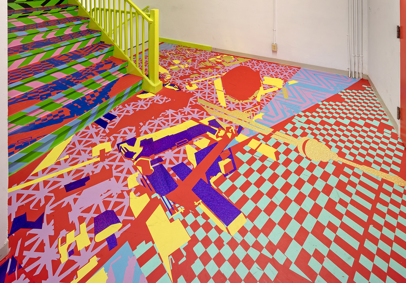 A brightly-colored art installation in a stairwell