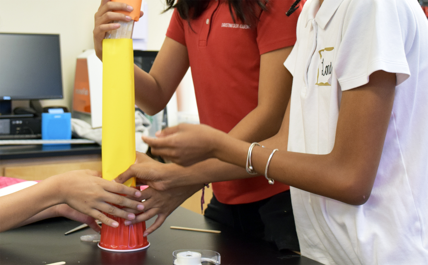 Students work on a project as part of Girls Code the World program