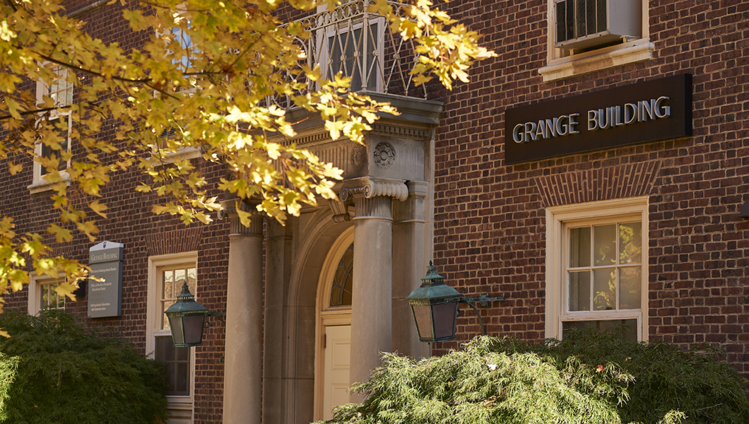 Front of Grange Building in the fall