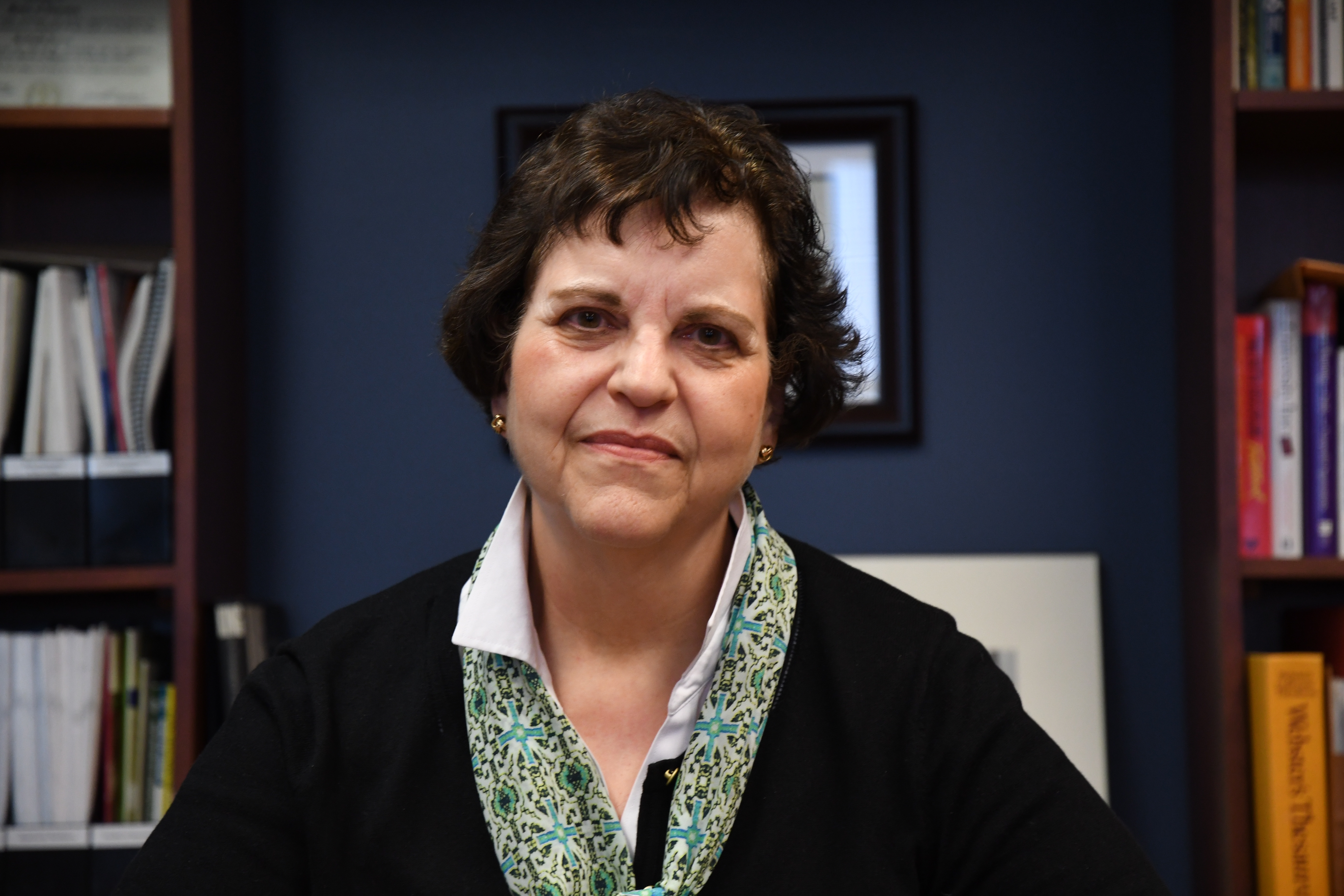 Anna Griswold poses in her office