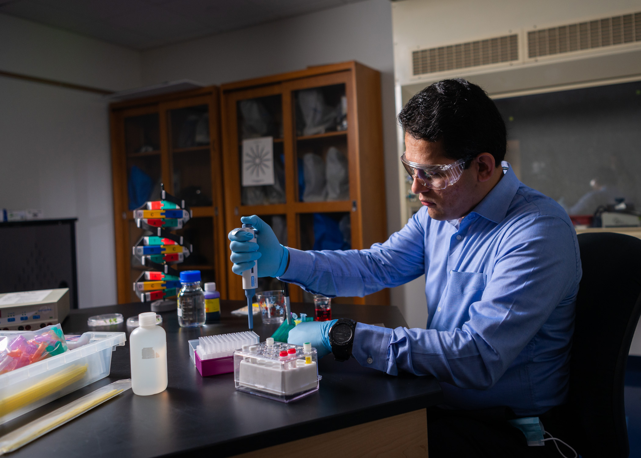 A scientist at their desk working on health research