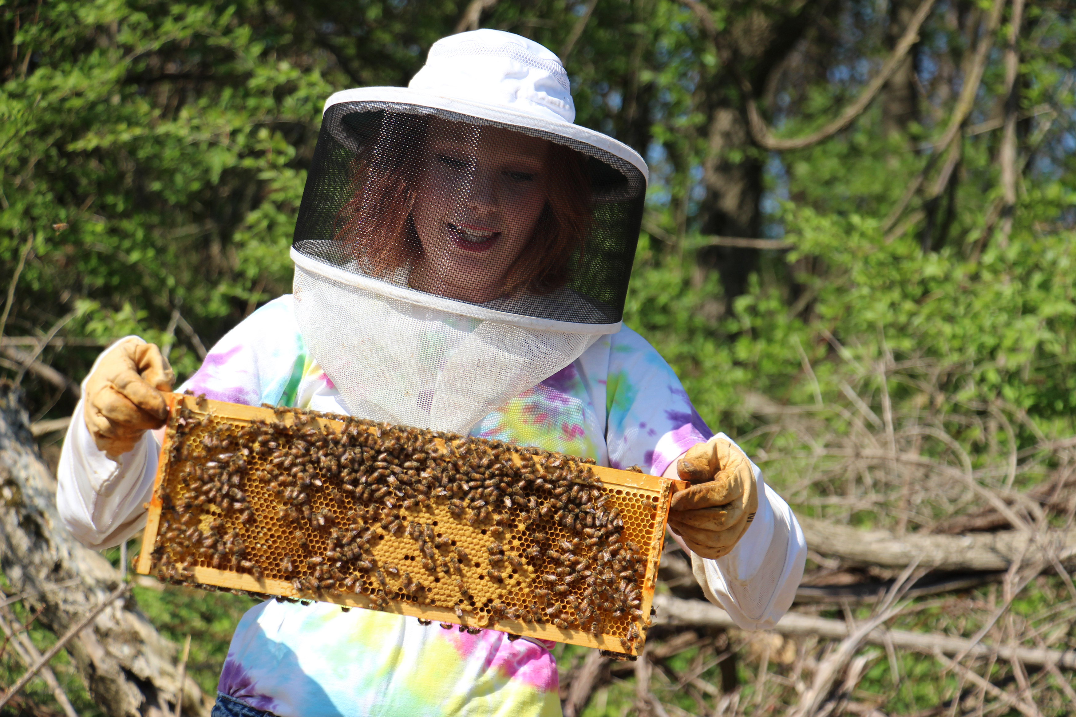 Darnell with honey bee boxes