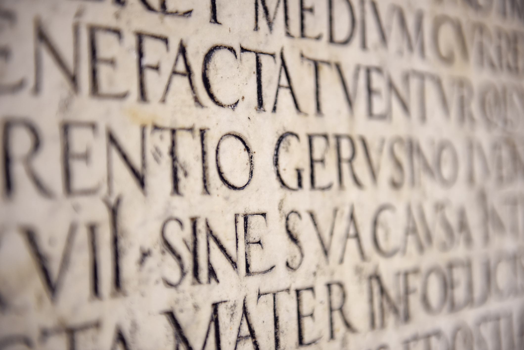 Latin words engraved in stone