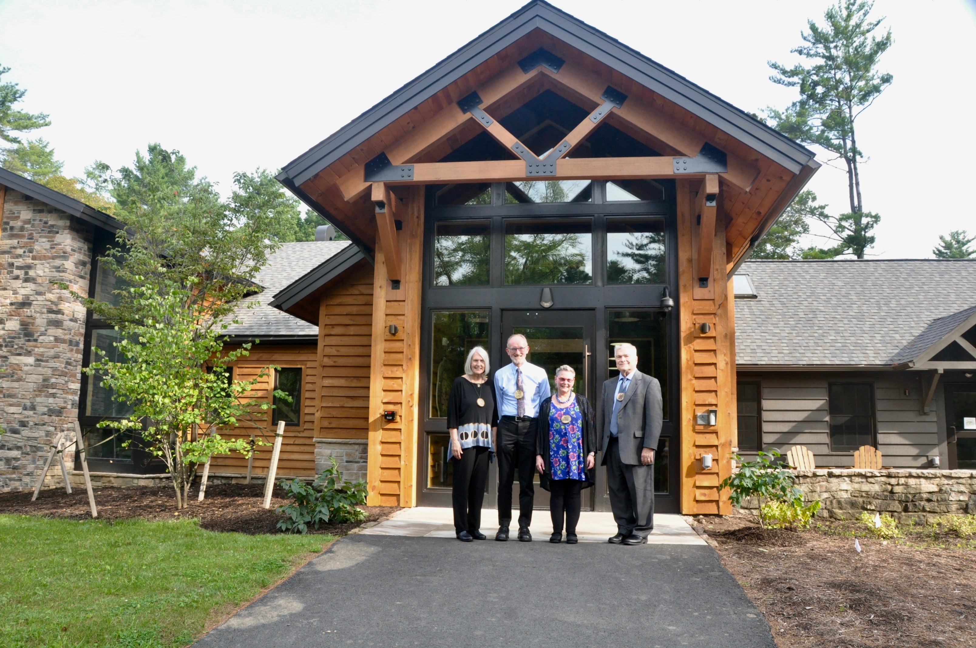 Mary Ellen and Tom Litzinger, Penn State President Eric Barron and his wife, Molly, at Shaver's Creek Environmental Center