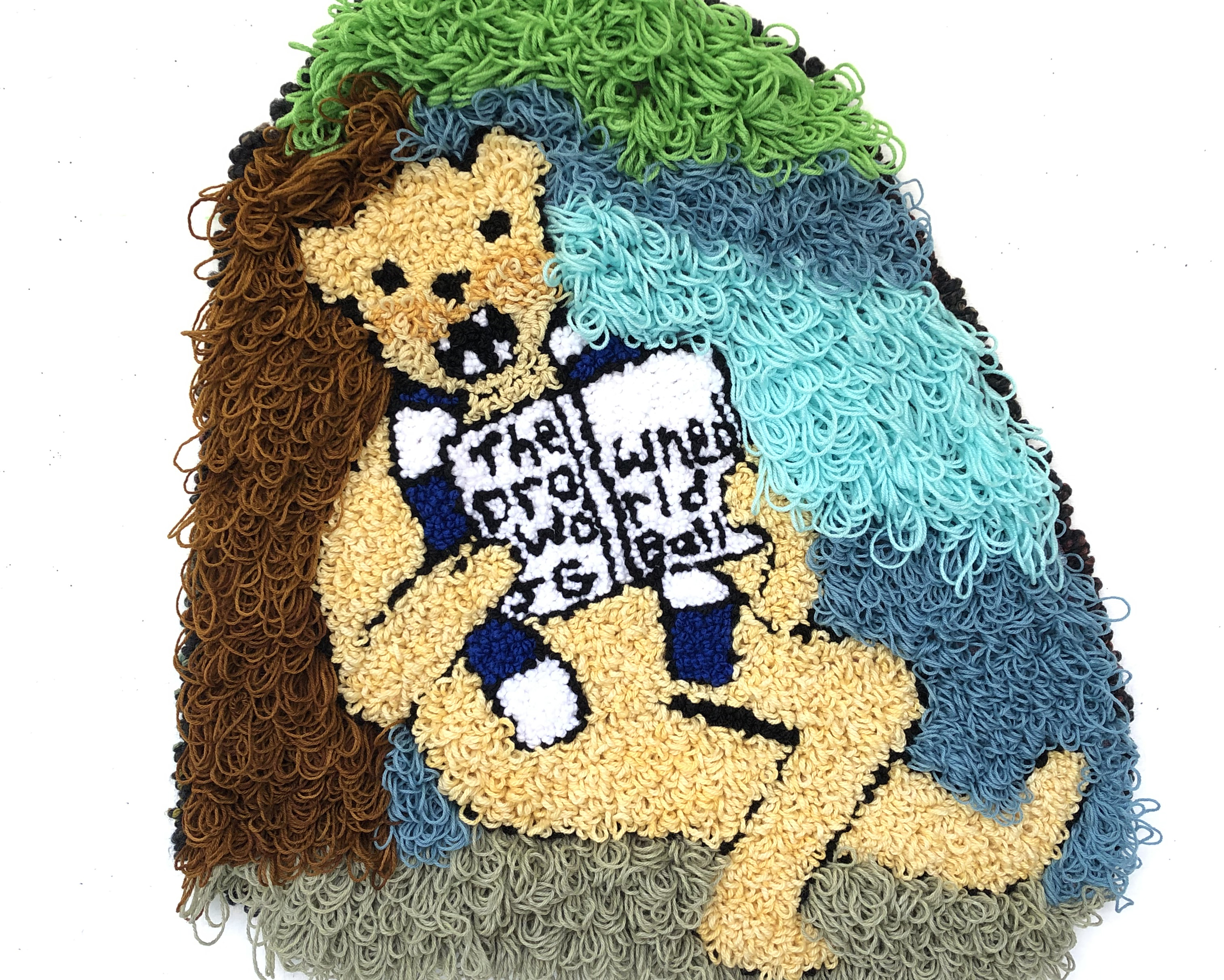 Nittany Lion reading a book