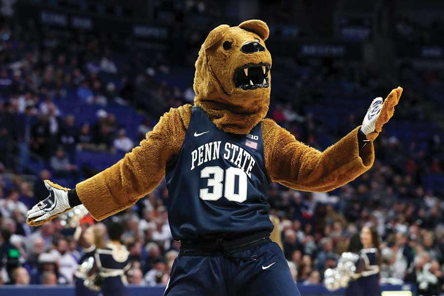 The Nittany Lion stands in front of a crowd during a basketball game at the Bryce Jordan Center.