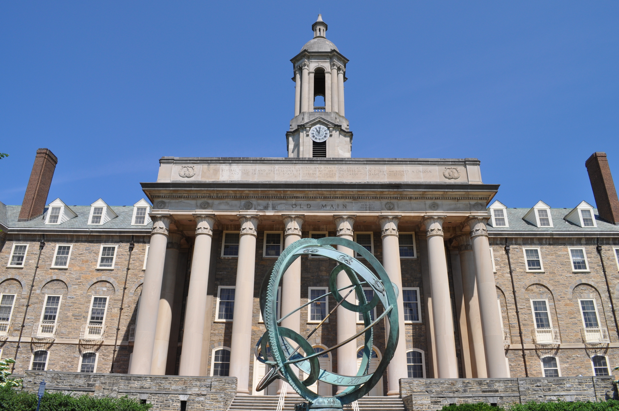 Photo of the front of Old Main at University Park