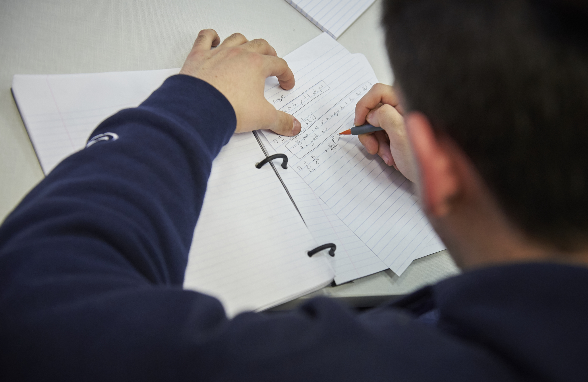 Student works on math assignments