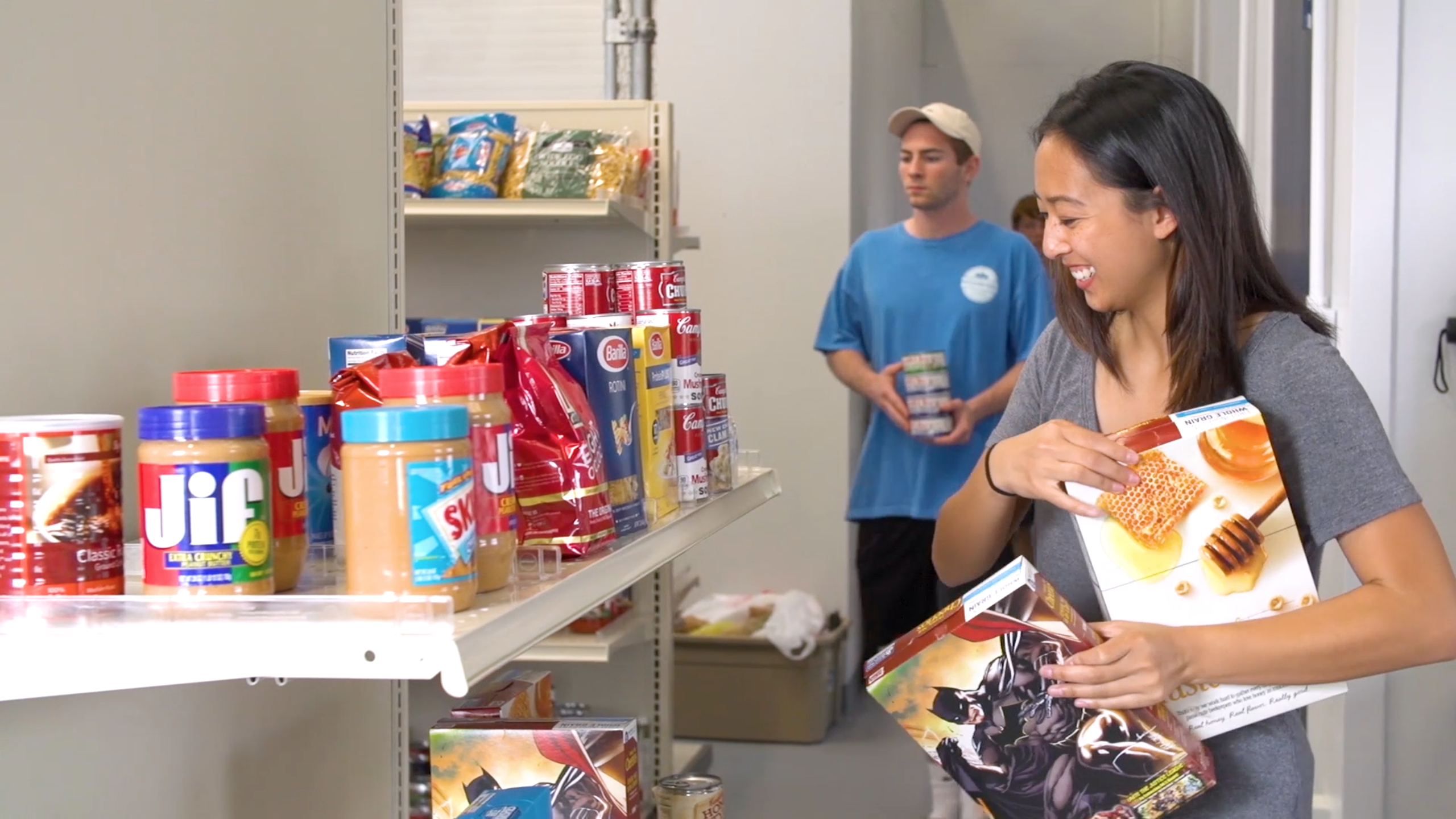 Students stocking shelves in Lion's Pantry