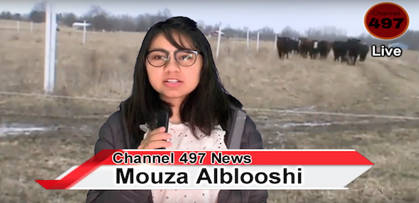 Student greenscreened over a pasture scene pretending to be a news reporter